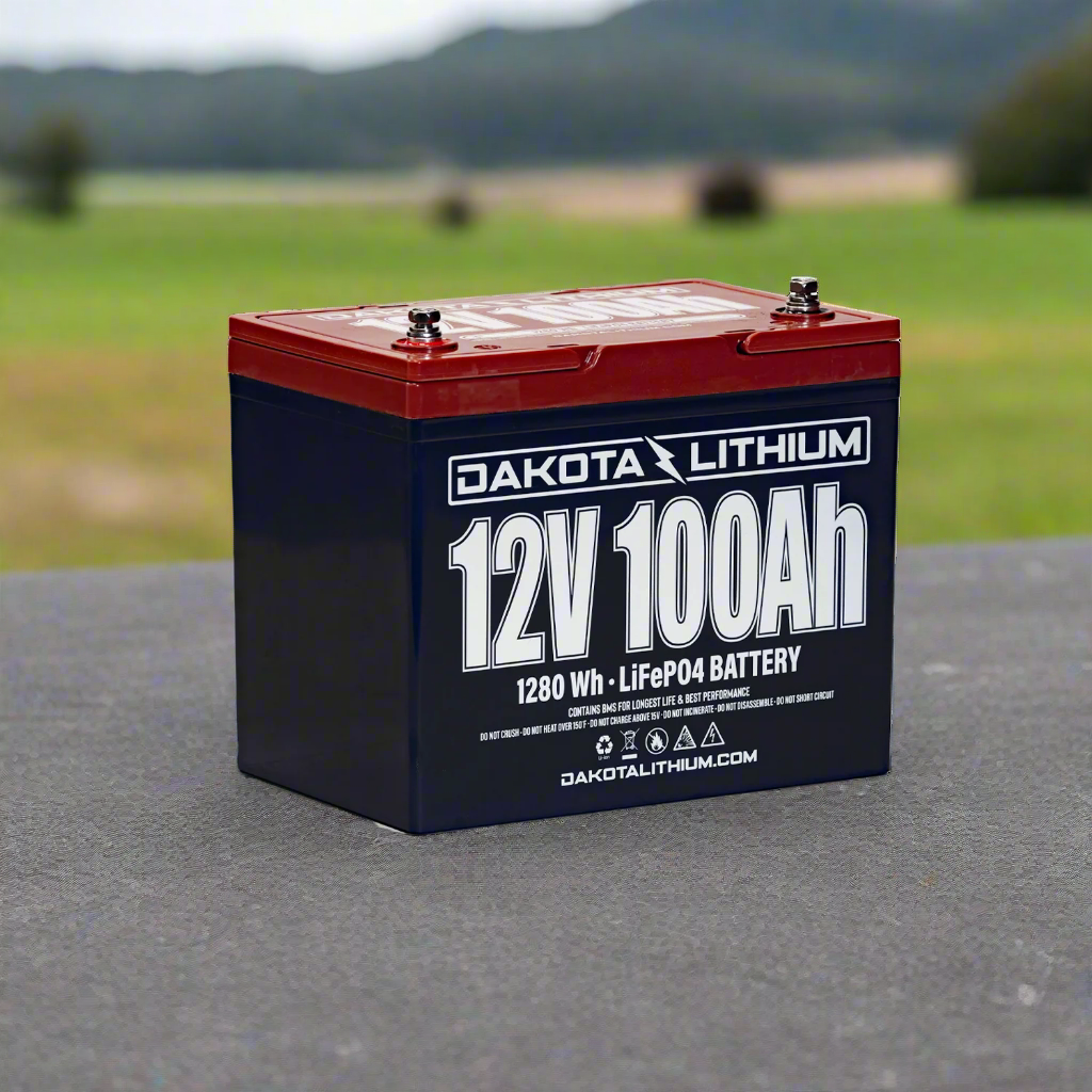 Dakota Lithium battery with a scenic background
