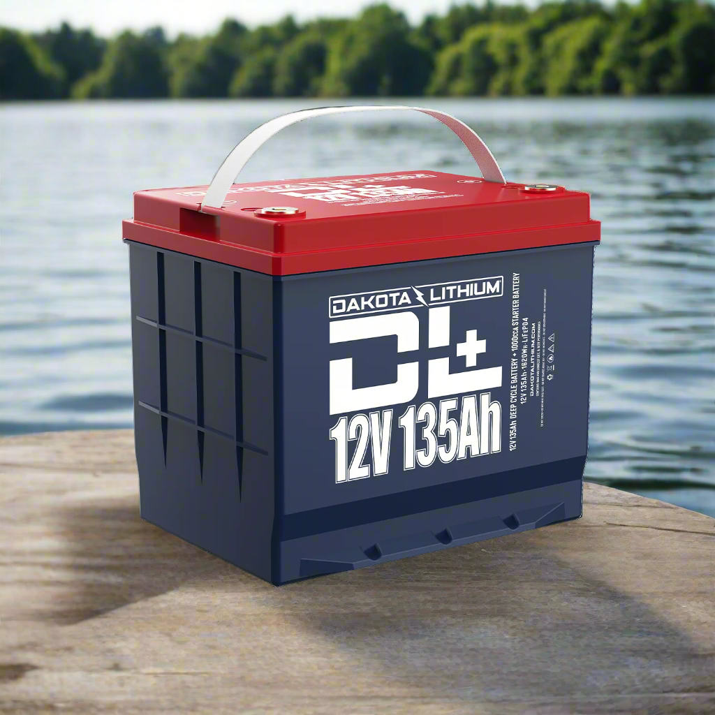 Dakota Lithium battery on a dock with water and trees in the background